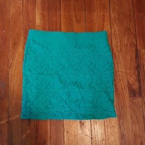 Short green lace skirt